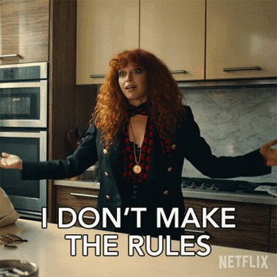 A Woman With Red Hair Says I Don 'T Make The Rules GIF