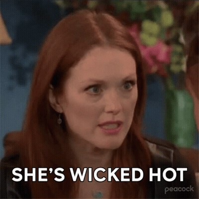 A Woman With Red Hair Says She 'S Wicked Hot GIF