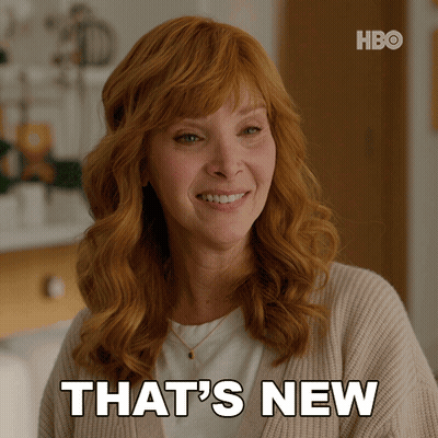 A Woman With Red Hair Says That 'S New In Front Of A Hbo Logo GIF