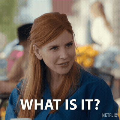 A Woman With Red Hair Says What Is It In A Netflix Ad GIF
