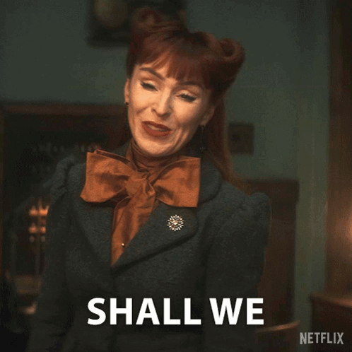 A Woman With Red Hair Says Wrap This Up . GIF