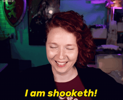 A Woman With Red Hair Smiles And Says I Am Shooketh GIF