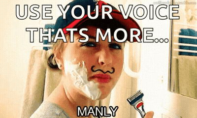 A Woman With Shaving Cream On Her Face Is Holding A Razor And Says Use Your Voice That 'S More Manly GIF
