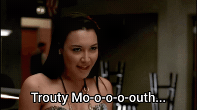 A Woman With The Words Trouty Mo-O-O-O-Outh Written On Her Face GIF