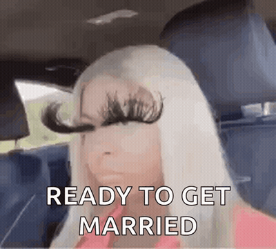 A Woman With Very Long Eyelashes Is Sitting In A Car And Ready To Get Married . GIF