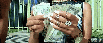 A Woman With White Nails Is Holding A Stack Of 20 Dollar Bills In Her Hands GIF