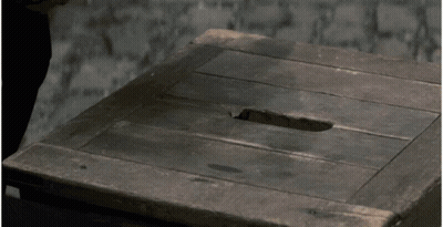 A Wooden Table With A Hole In The Middle GIF