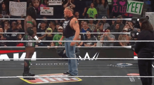 A Wrestler In A Ring With A Sign That Says Ruthless Depression On It GIF