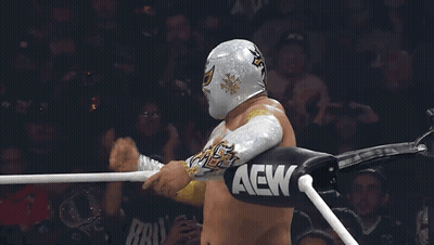 A Wrestler In A Ring With Aew Gloves GIF