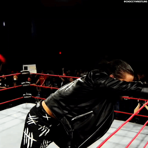 A Wrestler In A Ring With The Word Choccy Wrestling On The Bottom Right GIF
