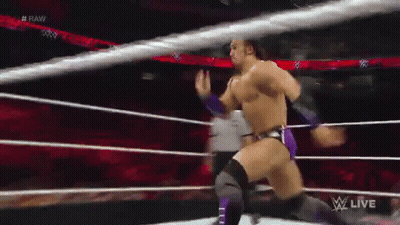 A Wrestler In A Ring With The Word Raw On The Bottom GIF