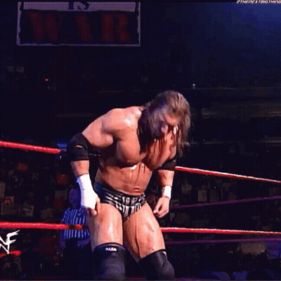 A Wrestler In A Wrestling Ring With A Sign That Says It 'S Over GIF