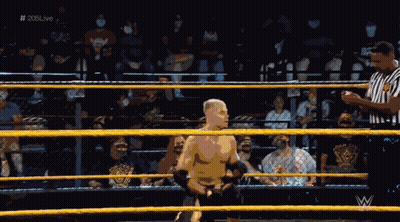 A Wrestler In A Wrestling Ring With The Hashtag # 205Live GIF
