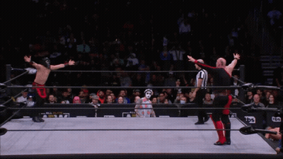 A Wrestler Is Being Lifted By Another Wrestler In A Ring That Says Abw On The Side GIF