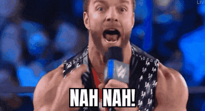 A Wrestler Is Holding A Microphone And Saying " Nah Nah " GIF