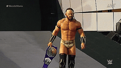 A Wrestler Is Holding A Purple Wrestling Championship Belt In Front Of A WWE Logo GIF