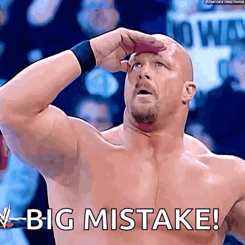 A Wrestler Is Holding His Hand To His Forehead And Says Big Mistake ! GIF