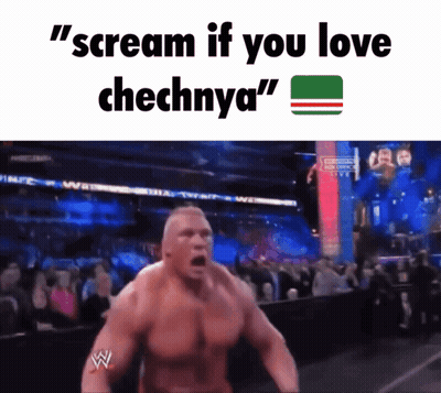 A Wrestler Is Screaming In Front Of A Crowd With The Words " Scream If You Love Chechnya " Below Him GIF