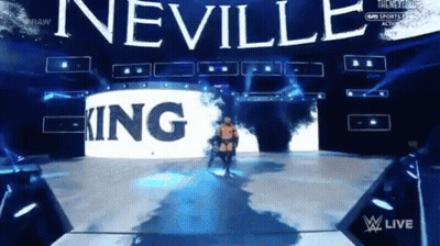 A Wrestler Is Walking Down A Stage With The Word Neville In The Background GIF