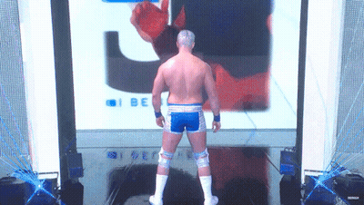 A Wrestler Stands In Front Of A Screen That Says I Be On It GIF