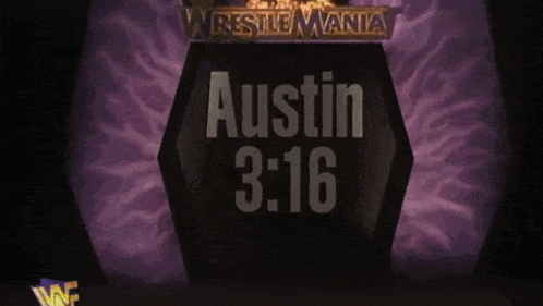 A Wrestler Wearing A Black Vest That Says 3 % GIF