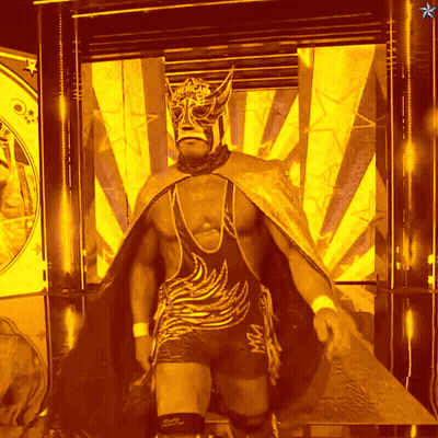A Wrestler Wearing A Mask And A Cape That Says Mgm On It GIF