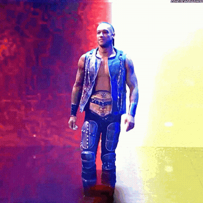 A Wrestler With A Belt That Says ' Intercontinental Heavyweight Champion ' On It GIF
