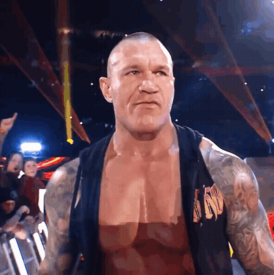 A Wrestler With A Shirt That Says Nm On It GIF