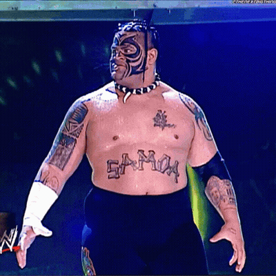 A Wrestler With A Tattoo On His Chest That Reads Samoa GIF