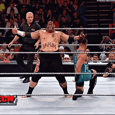 A Wrestler With A Tattoo On His Chest That Says Samoa GIF
