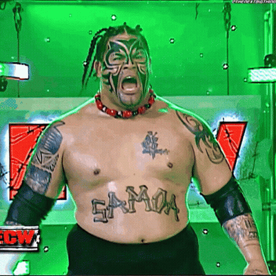 A Wrestler With A Tattoo On His Chest That Says Samoa GIF