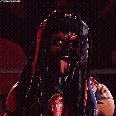 A Wrestler With His Face Painted Like A Monster With Sharp Teeth . GIF