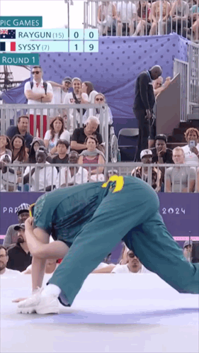 A Wrestling Match Between Raygun And Syssy Is Being Played At The Pic Games GIF