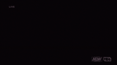 A Wrestling Match Is Being Shown Live On A Tbs Network GIF