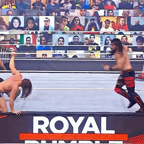 A Wrestling Match Is Being Shown On The Royal Rumble Tv Show GIF