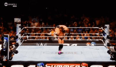 A Wrestling Match Is Being Shown On Tnt Sports GIF