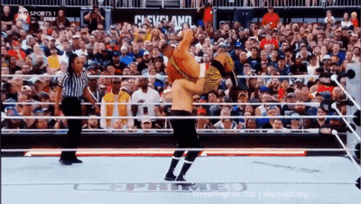 A Wrestling Match Is Being Shown On Tv With The Words Cleveland In The Corner GIF