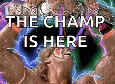 A Wrestling Match With The Words The Champ Is Here Written On It GIF