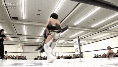 A Wrestling Ring With A Sign That Says Stardom GIF