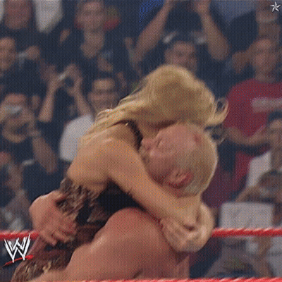 A Wrestling Ring With A W Logo On It GIF