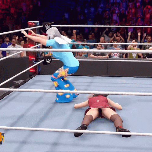 A Wrestling Ring With A W Logo On The Corner GIF