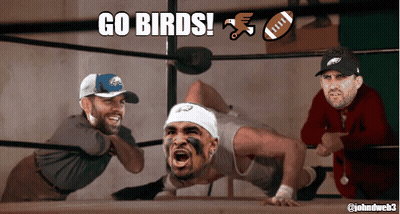 A Wrestling Ring With Eagles Players And The Words Go Birds GIF