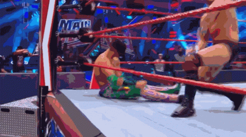 A Wrestling Ring With The Word Main On The Side GIF