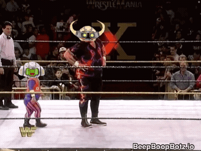 A Wrestling Ring With The Word Wrestlemania On The Bottom GIF