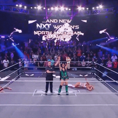 A Wrestling Ring With The Words " And New Nxt Women 'S North American Champion " On It GIF