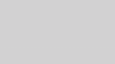 A Yellow And Black Background With A Pattern Of Dots GIF