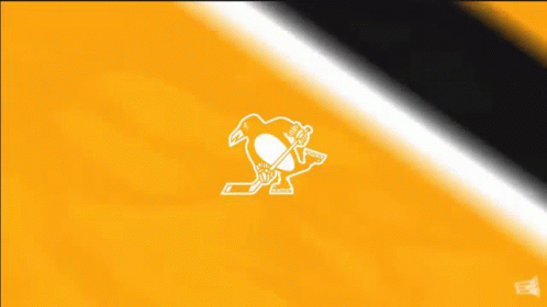 A Yellow And Black Background With A Skull And The Letter A GIF