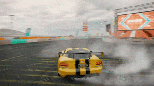 A Yellow And Black Sports Car With A License Plate That Says Eh - 912 GIF