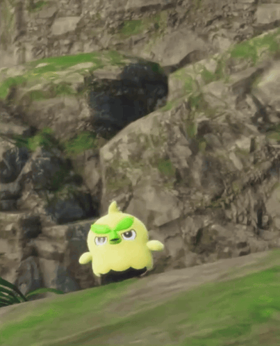 Yellow And Black Stuffed Animal With Green Hat GIF