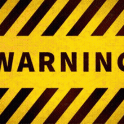 A Yellow And Black Warning Sign With Black Stripes And The Word Warning Written On It . GIF